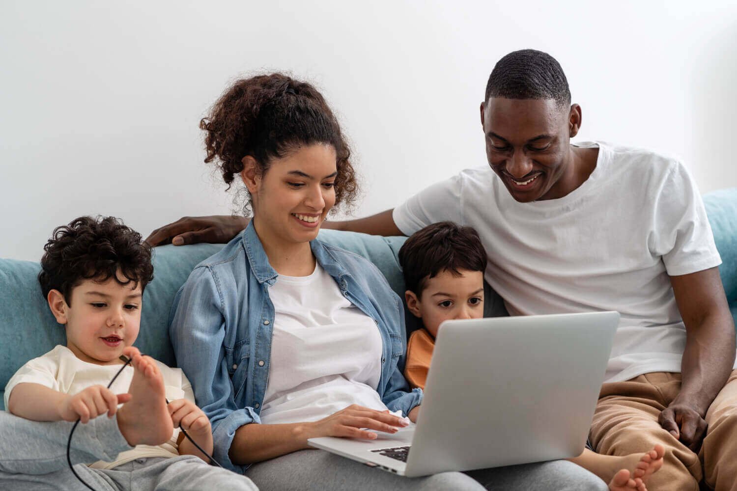 happy-black-family-watching-having-fun-while-watching-something-on-laptop-1-1.jpg